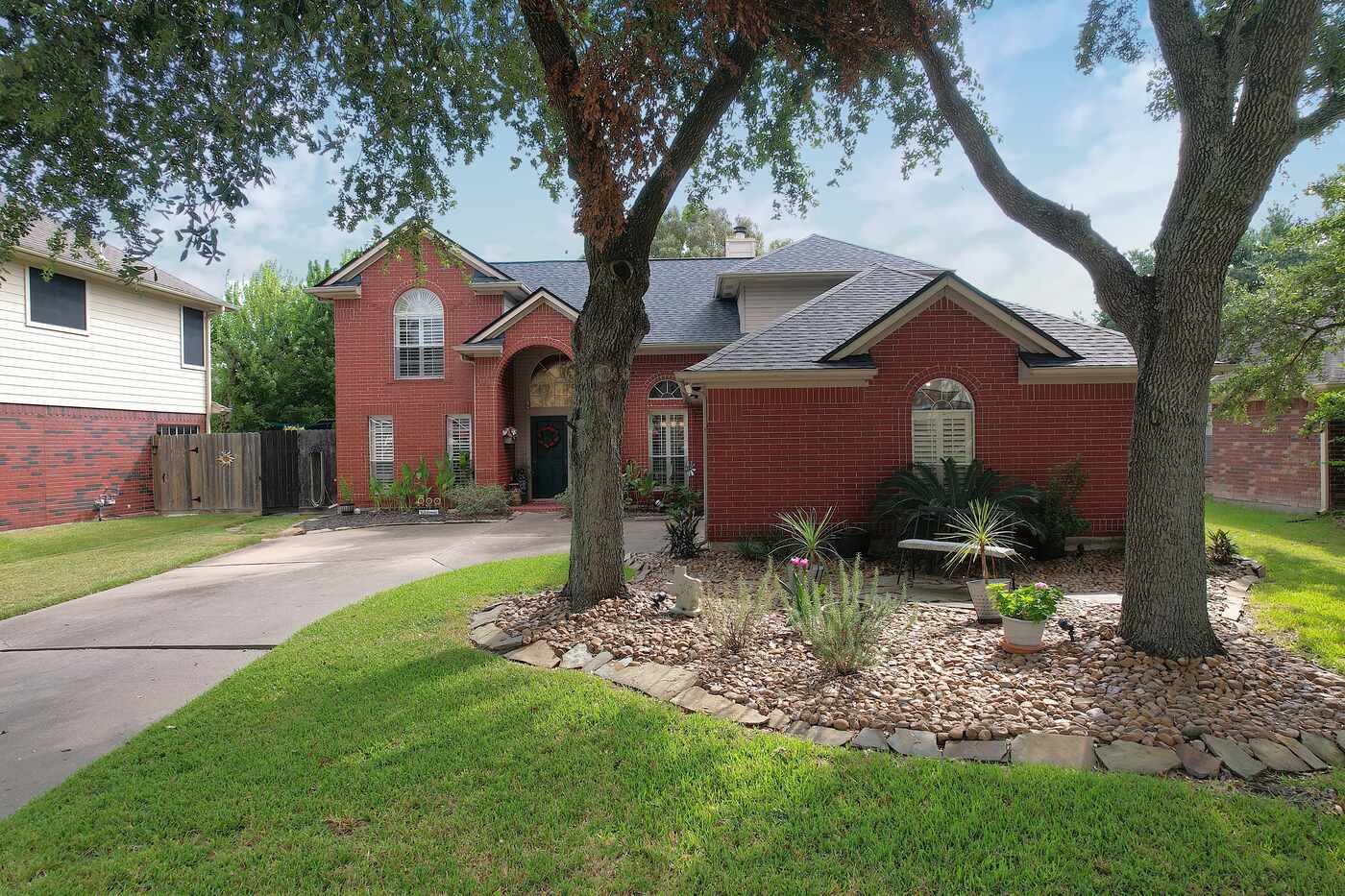 110 Cloudbridge Drive, League City — traditional brick two-story
